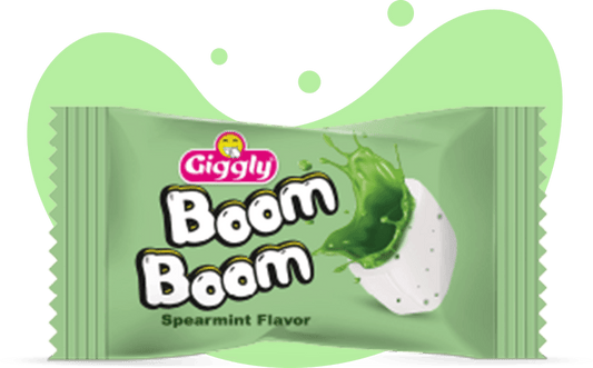 Giggly Boom Boom spearmint flavor packet on a black background